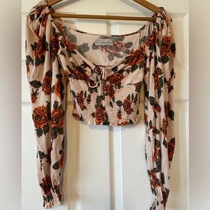 Urban Outfitters floral crop top with gathered raw hem sleeves and tie front